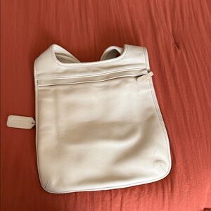 Vintage Coach Cream Leather Hippie Backpack in light cream / butter yellow color